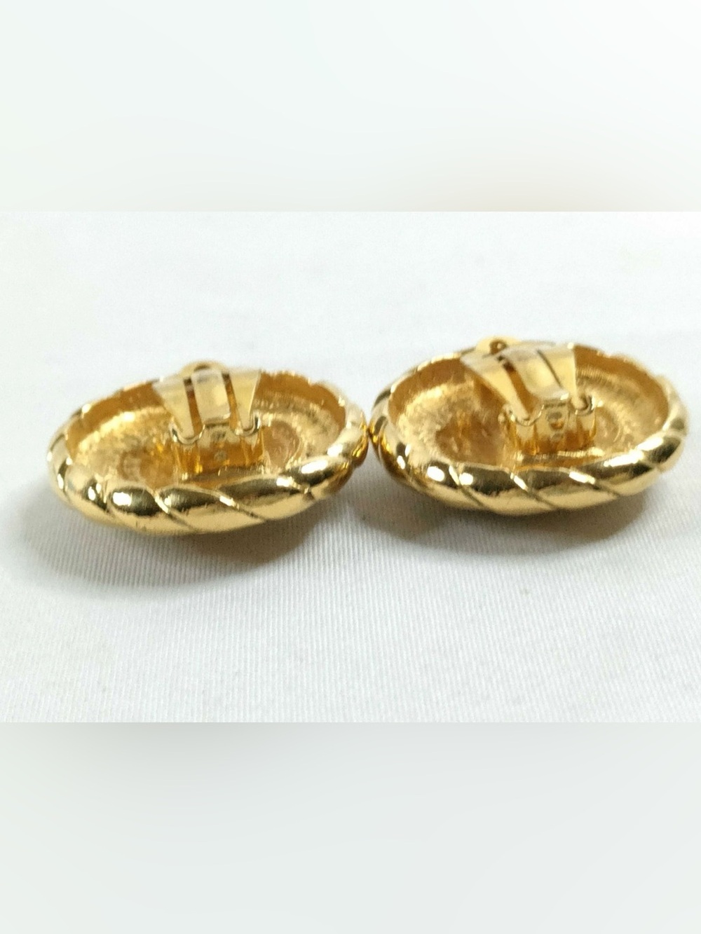 A Pair of Vintage Chanel Gold-Tone CC Medallion Button Clip-On Earrings - Picture 8 of 10